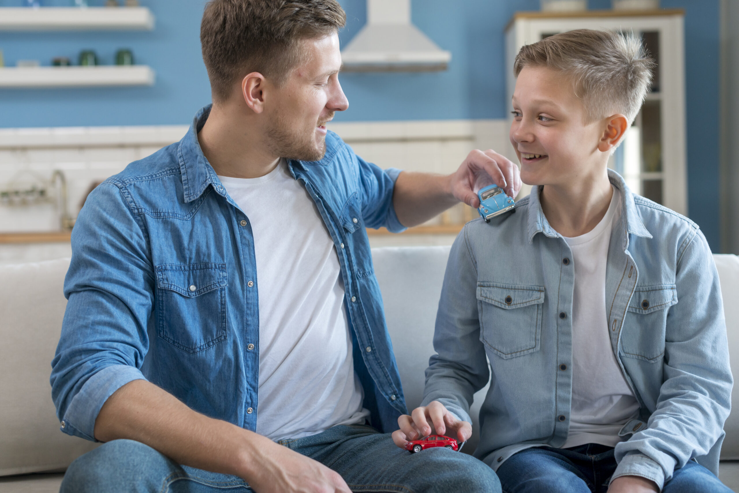 father-son-playing-with-toy-cars father-son-playing-with-toy-cars